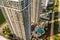 Aerial photo Blue and Green Diamond highrise modern upscale condominium on the ocean