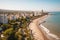 aerial photo from drone of beautiful city and the beach , AI Generated