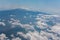 Aerial photo of Etna volcano with smoke and nice cloudscape