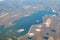 Aerial photo of Farmland. view from the plane to the ground. squares of fields under the clouds