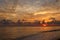 Aerial photo from flying drone of a fascinating nature landscape with dramatic evening sunset sky which reflected in sea water