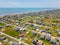 Aerial photo homes raised on stilts in flood zone Port Bolivar Texas