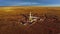 Aerial photo of hydraulic fracturing equipment at sunset. FRACKING