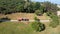 Aerial Photo of Massey Ferguson 390T Tractor Abbey Tanker spreading manure in a field on a farm in UK