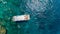 Aerial photo of people snorkeling in tropical Coral reef