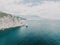 aerial photo of rock Parus Sail and Ayu-Dag Bear Mountain and near Gaspra, Yalta, Crimea at bright sunny day over