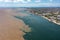 Aerial photo of SatarÃ©m City and the meeting of the waters of the Amazon Rivers with the TapajÃ³s River in ParÃ¡, Brazil.