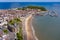 Aerial photo of the town centre of Scarborough in East Yorkshire in the UK showing the coastal beach and harbour with boats and