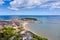 Aerial photo of the town centre of Scarborough in East Yorkshire in the UK showing the coastal beach and harbour with boats and