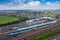 Aerial Photo of a train station works depot with lots of trains in the tracks located in the village of Halton Moor in Leeds, West