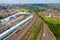 Aerial Photo of a train station works depot with lots of trains in the tracks located in the village of Halton Moor in Leeds, West