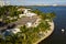 Aerial photo waterfront mansion homes with palm trees Miami Biscayne Bay