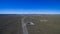 Aerial photo of windmills powered by aerofoil that provide sustainable energy.