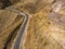 Aerial photograph of an asphalted road in the Jordanian mountains, taken with the drone