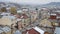 Aerial photograph, top view of the old European city, historic architecture, people walking, cars driving; Ukraine, Lviv, November