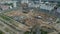 Aerial photography of the construction site. Start of construction of a modern city block. Construction cranes are on the site