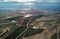 Aerial photography drone point of view region Murcia, countryside area, agricultural fields and meadows, cloudy sky