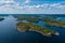 Aerial photography on Ladoga skerries. Ladoga Lake in Karelia in hot summer. Rocky wild islands in the middle of the