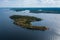 Aerial photography on Ladoga skerries. Ladoga Lake in Karelia in hot summer. Rocky wild islands in the middle of the