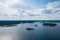 Aerial photography on Ladoga skerries. Ladoga Lake in Karelia in hot summer. Rocky wild islands in the middle of the