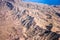 Aerial photography of landforms over Nevada with mountains and lake Mead