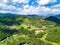 Aerial photography of magnificent scenery of blue sky and green mountains at Kunlun Pass in Nanning, Guangxi, China