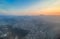 Aerial photography of Mexico City, houses, buildings and its large avenues are distinguished at sunset