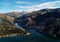 Aerial photography rocky snow-capped Sierra Nevada mountains Embalse de Canales Reservoir in Guejar Sierra