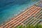 Aerial photography of tourists playing and taking sunbath on a s