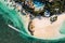 Aerial picture of the east coast of Mauritius Island. Flying above the turquoise lagoon of Mauritius in the region of Belle Mare