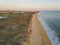 Aerial picture over Gale beach in Portugal during sunset in summer