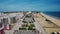 Aerial. Portuguese beaches and fishing boats in the tourist village Monte Gordo.