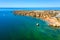 Aerial from Praia do Camillo on a rocky southcoast near Lagos in Portugal