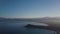 Aerial of a pretty sunrise on the coast, mountains. Sardinia, Italy