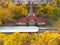 Aerial railway station in yellow autumn forest