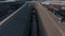 Aerial reveal of Sheffield City over industrial warehouse saw tooth roofs