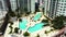 Aerial reveal swimming pool at Vizcayne Condominium Downtown Miami FL