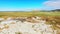 Aerial revealing view scenic natural mud volcanoes formations in Chachuna nature reserve