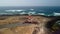 Aerial reverse reveal clip of the lighthouse Faro del Toston near El Cotillo in Fuerteventura