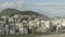 Aerial, reversed and panoramic shot of the city of Rio de Janeiro in the summer time