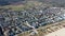 Aerial - right turn panning - view of coastline and city of Ahlbeck on the peninsula Usedom in Germany