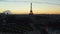 AERIAL: Rising up over beautiful Paris, France revealing Eiffel Tower,Tour Eiffel in Epic Sunset light with amazing sky