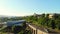 Aerial rising view Tbilisi panorama with traffic, modern Rike park buildings