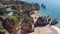Aerial from rocks and ocean in Alvor the Algarve Portugal