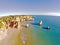 Aerial from rocks and ocean at Praia tres Irmaos in Algarve Port