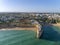 Aerial rocky famous seascape cape and Senhora da Rocha church. Algarve.