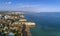 Aerial rocky famous seascape cape and Senhora da Rocha church. Algarve.