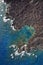 Aerial of rocky Maui coast.