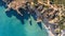 Aerial. Rocky shore formation and beaches of Portimao. View from sky.
