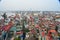 Aerial rooftop view of crowded Hanoi Vietnam houses showing living conditions.